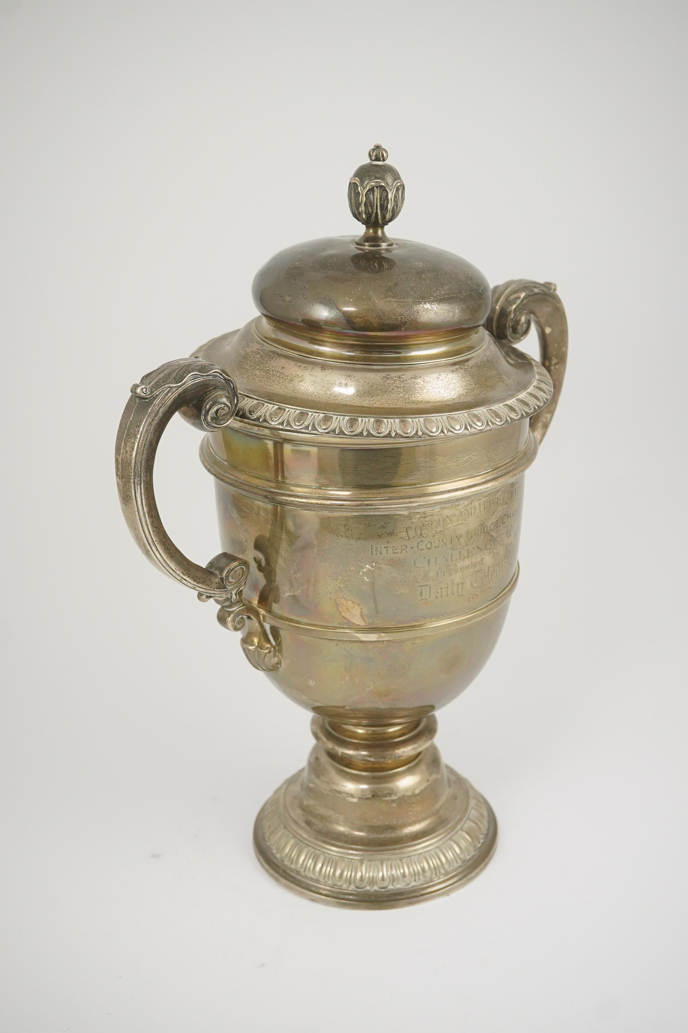 A George V silver two handled presentation trophy cup and cover by Hunt & Roskell Ltd (late Storr & Mortimer)